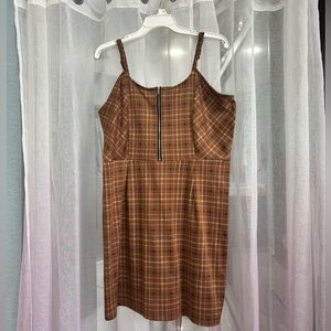 Brown plaid midi dress with zipper front and adjustable straps